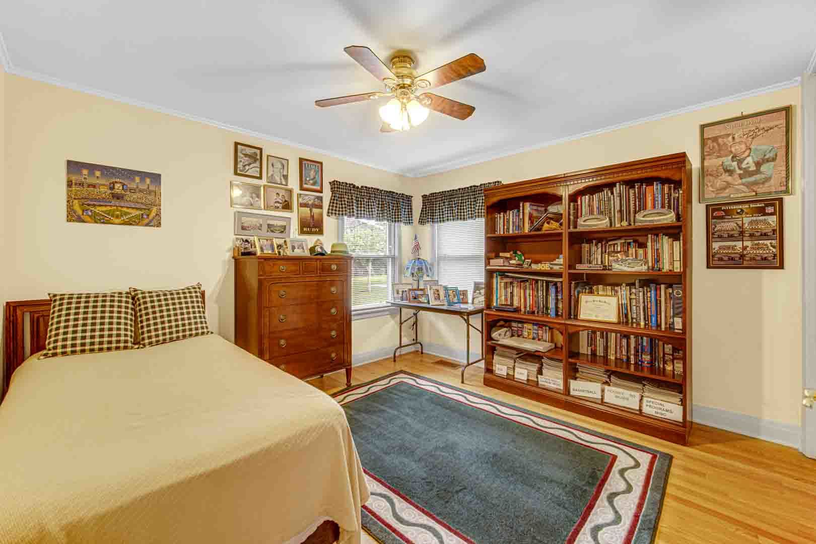 1740 Good Avenue Park Ridge, IL 60068 - Photo 13 of 22 a bedroom with a bed cabinets and window