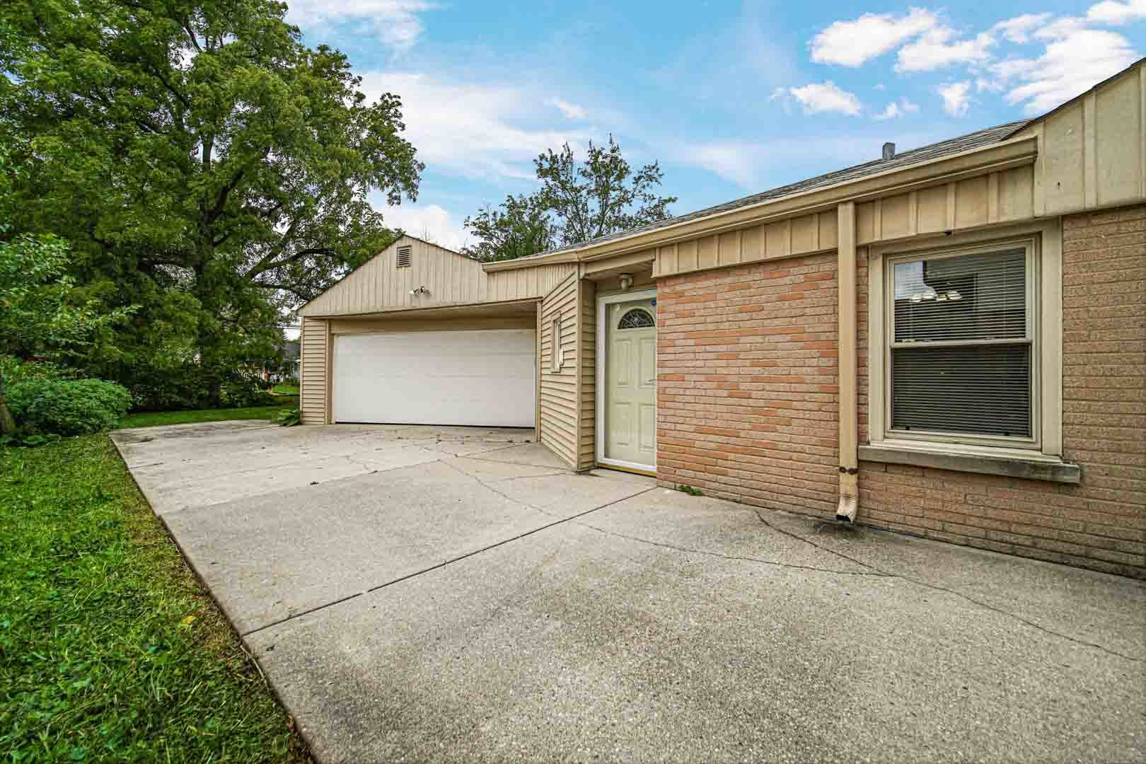 1740 Good Avenue Park Ridge, IL 60068 - Photo 17 of 22 a front view of a house with a garage