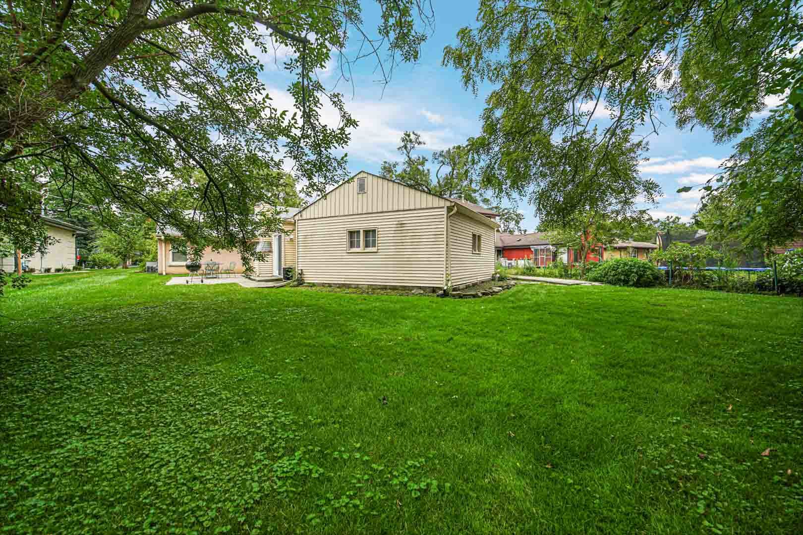 1740 Good Avenue Park Ridge, IL 60068 - Photo 18 of 22 a view of a house with a yard