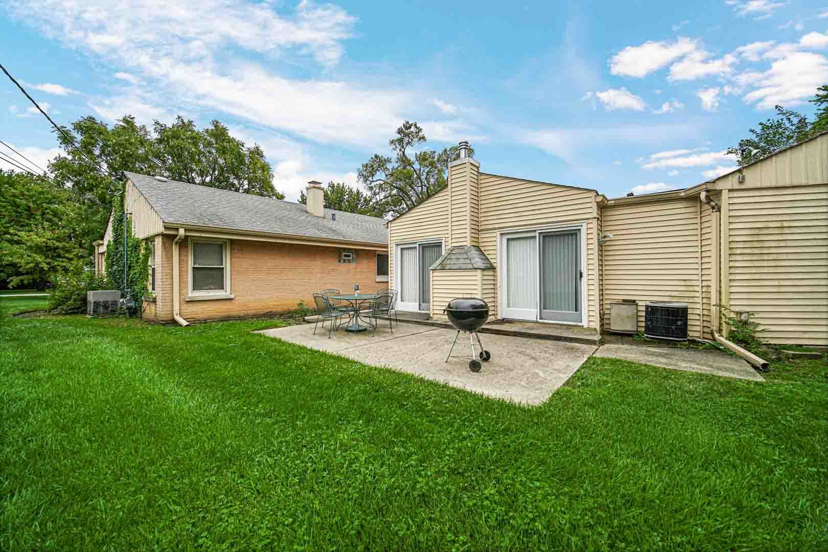 1740 Good Avenue Park Ridge, IL 60068 - Photo 19 of 22 a front view of house with yard and patio
