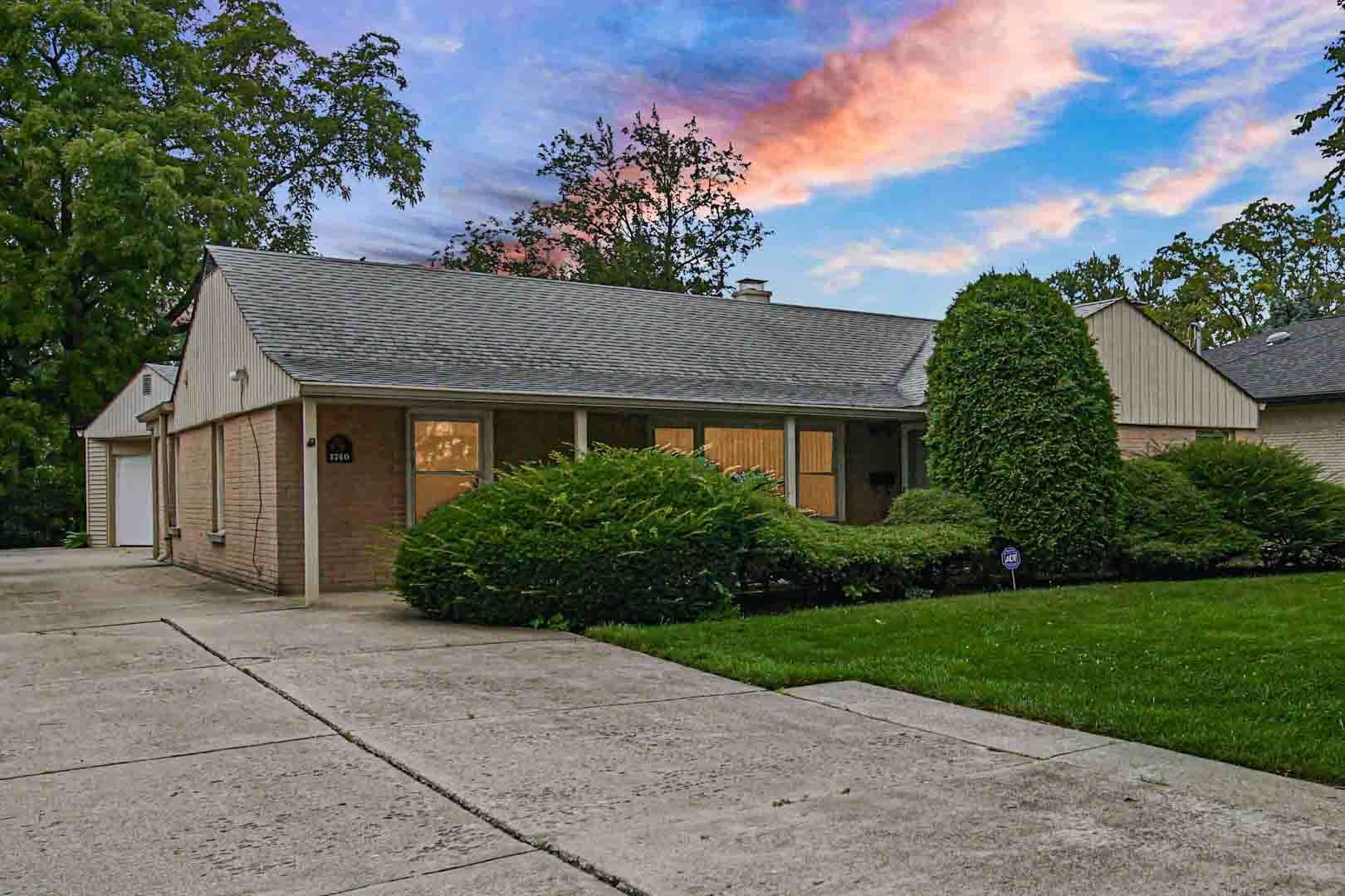 1740 Good Avenue Park Ridge, IL 60068 - Photo 20 of 22 a front view of a house with a yard