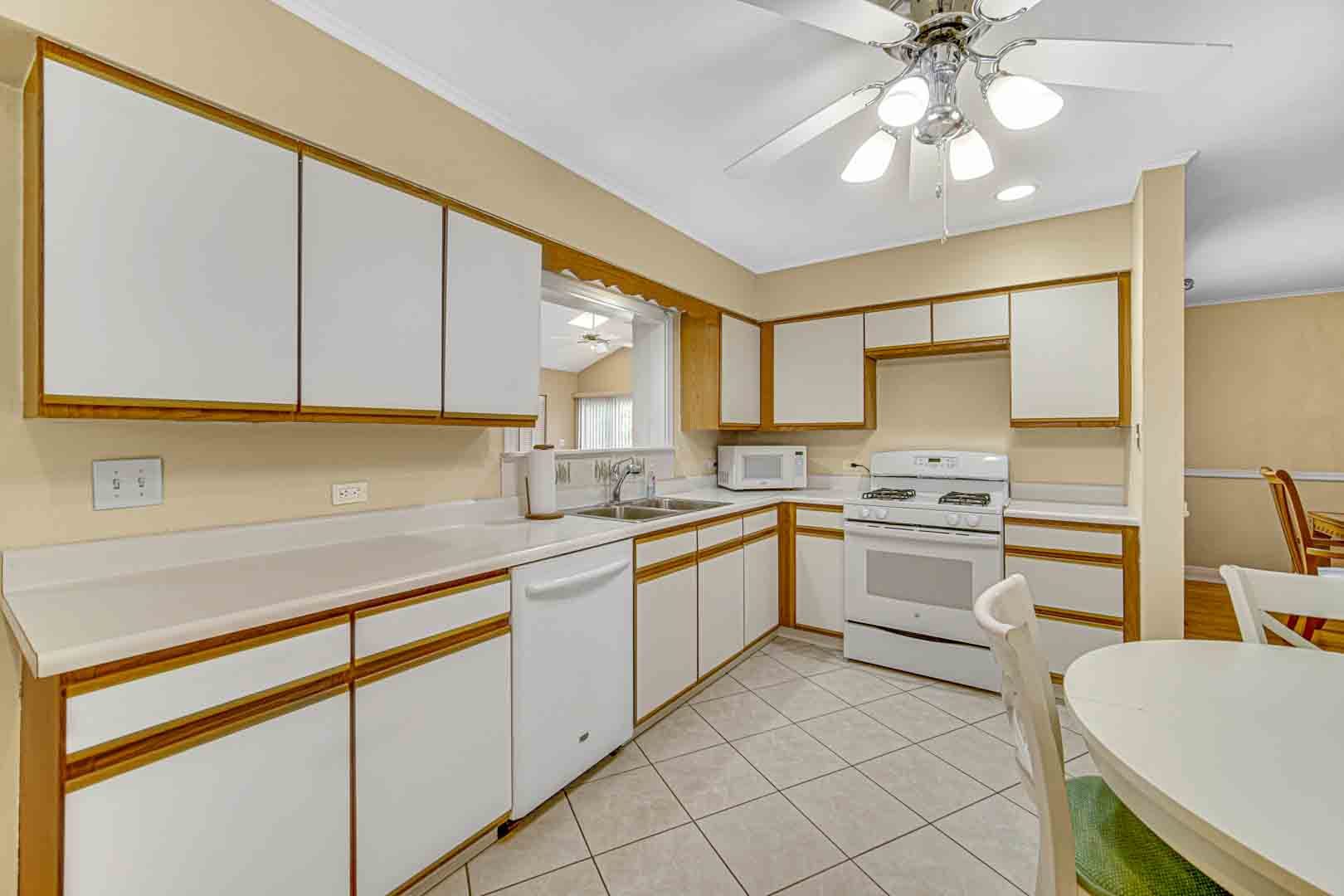 1740 Good Avenue Park Ridge, IL 60068 - Photo 7 of 22 a kitchen with a sink cabinets and window