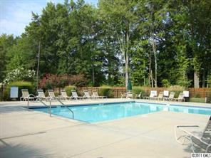 613 Colbert Way Fort Mill, SC 29715 - Photo 16 of 16 a view of a swimming pool with outdoor seating