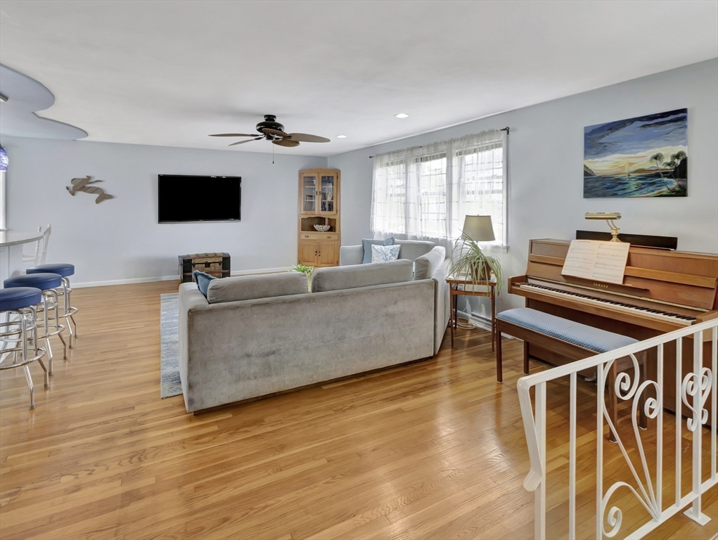 15 H Street Hull, MA 02045 - Photo 17 of 35 a living room with furniture and flat screen tv
