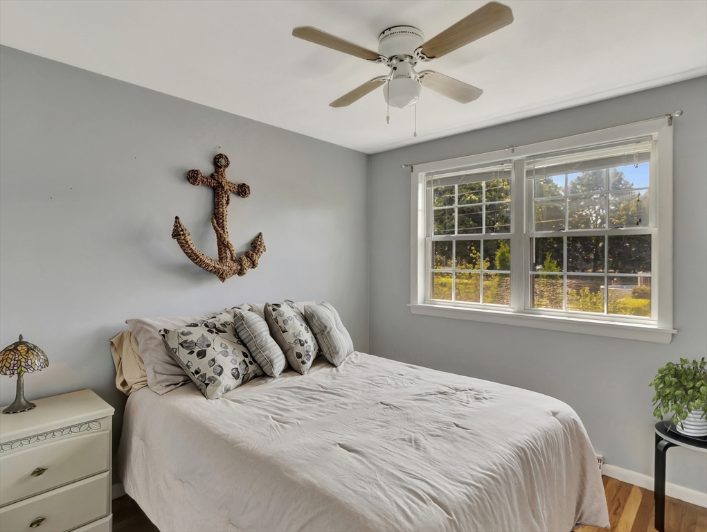 15 H Street Hull, MA 02045 - Photo 21 of 35 a bedroom with a bed and a window