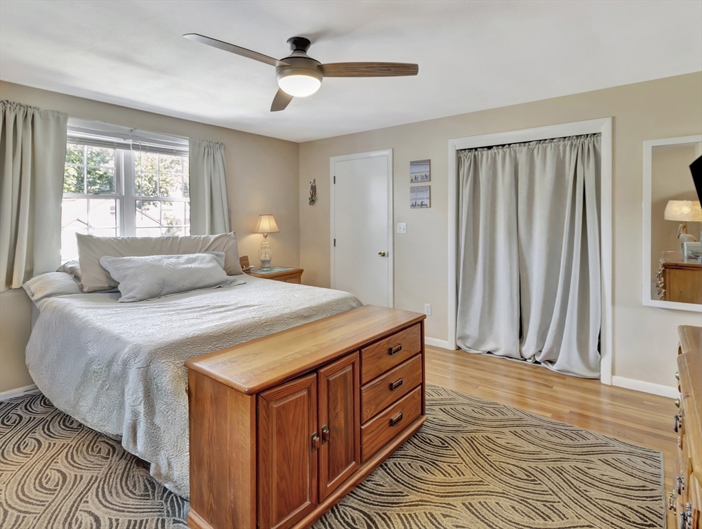 15 H Street Hull, MA 02045 - Photo 22 of 35 a bedroom with a large bed and a window