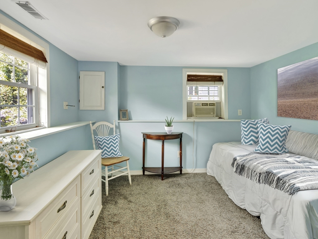 15 H Street Hull, MA 02045 - Photo 25 of 35 a bedroom with a bed and a window