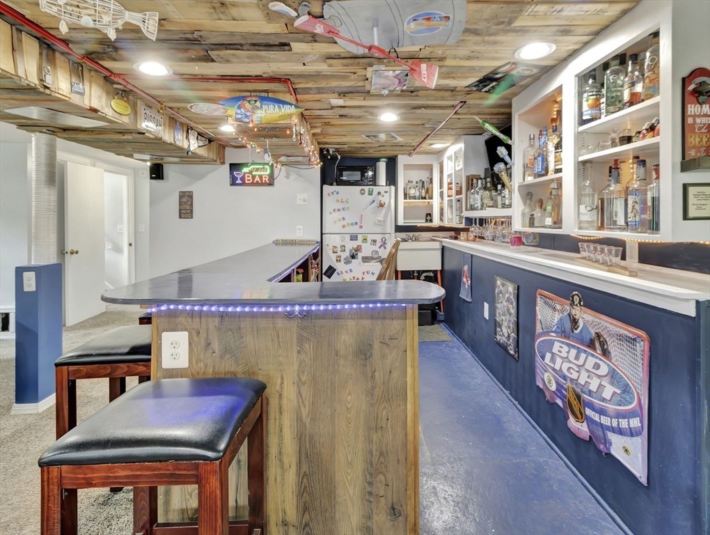 15 H Street Hull, MA 02045 - Photo 30 of 35 a view of a room with shelves