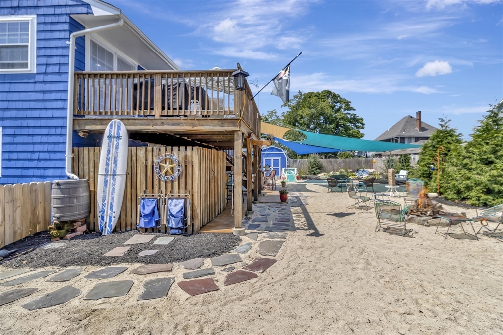 15 H Street Hull, MA 02045 - Photo 3 of 35 a view of a dinning room with large trees