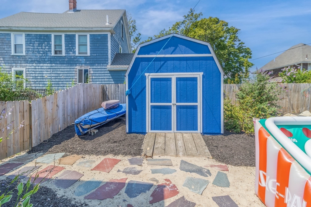 15 H Street Hull, MA 02045 - Photo 34 of 35 a front view of a house with a yard