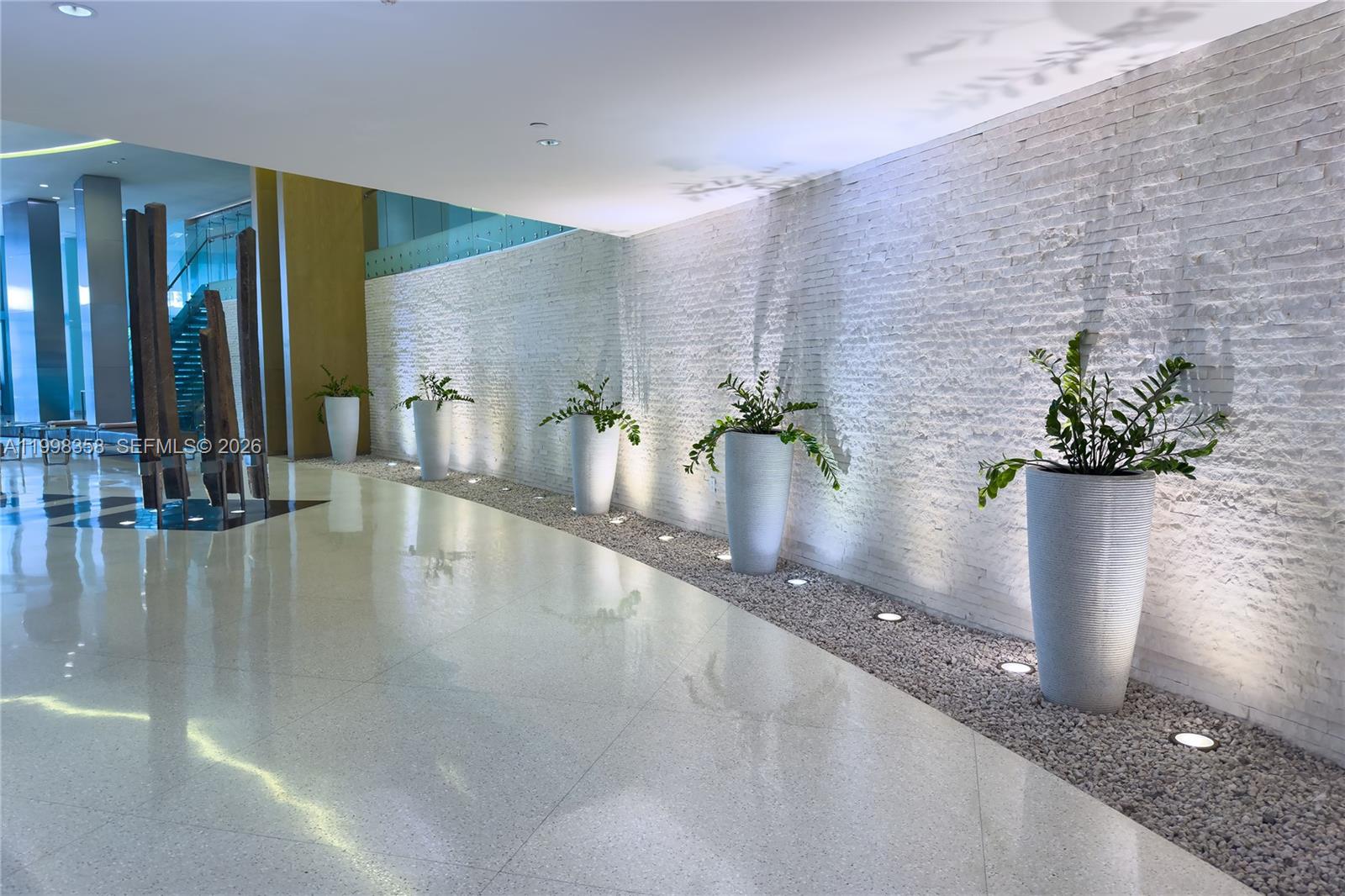 92 Southwest 3rd Street, Unit 3512 Miami, FL 33130 - Photo 27 of 67 a view of an entryway with a flower pot