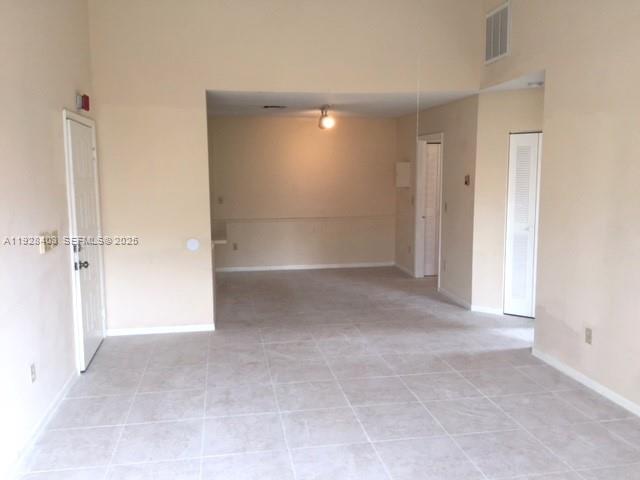 18324 Northwest 68th Avenue, Unit H Hialeah, FL 33015 - Photo 3 of 15 a view of empty room