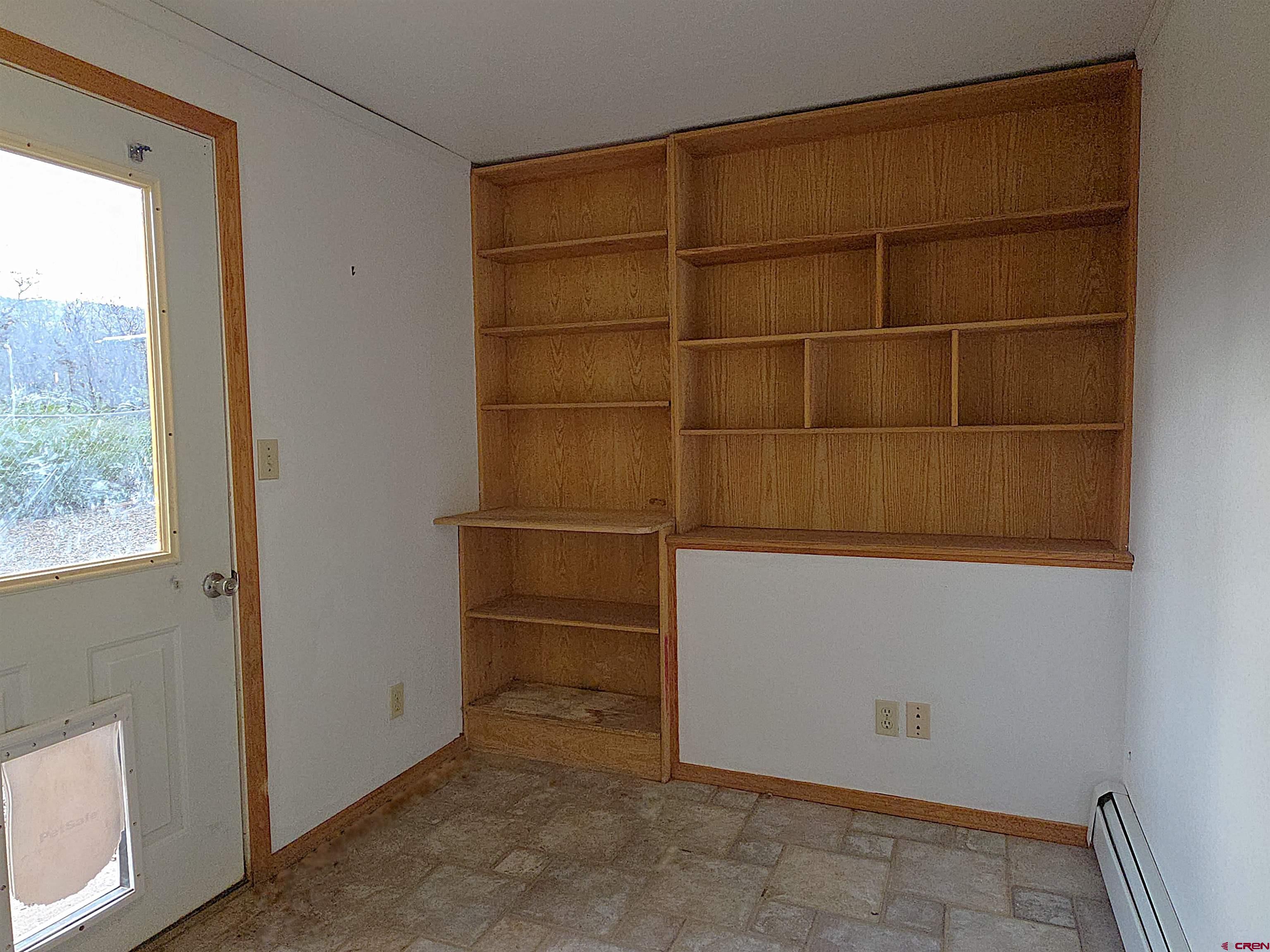21976 2225th Road Cedaredge, CO 81413 - Photo 20 of 29 Current use, Mud room with access to dog run