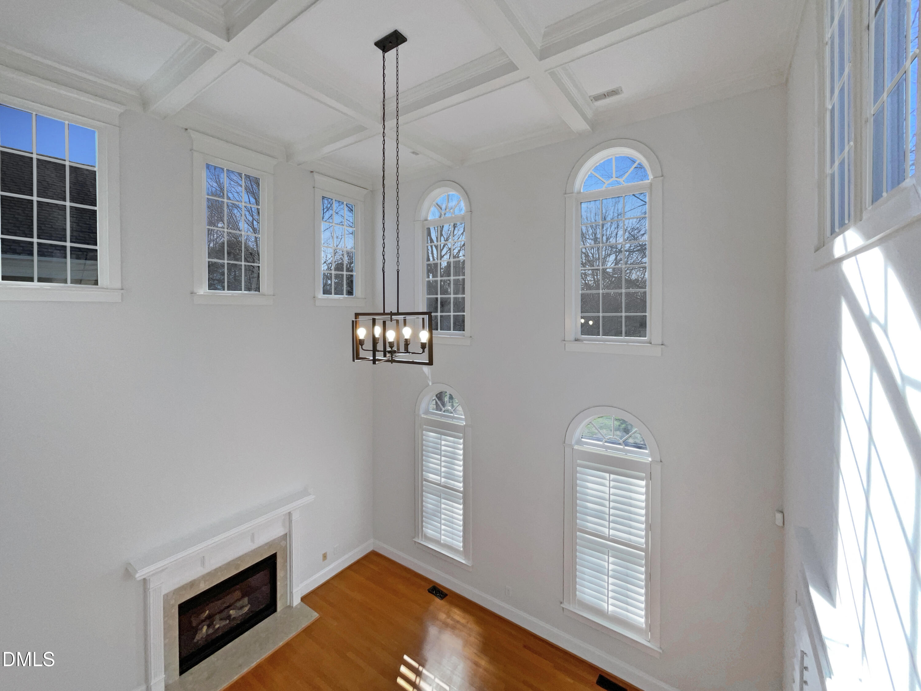 1703 Happiness Hill Lane Raleigh, NC 27614 - Photo 18 of 30 a view of empty room with wooden floor and fan