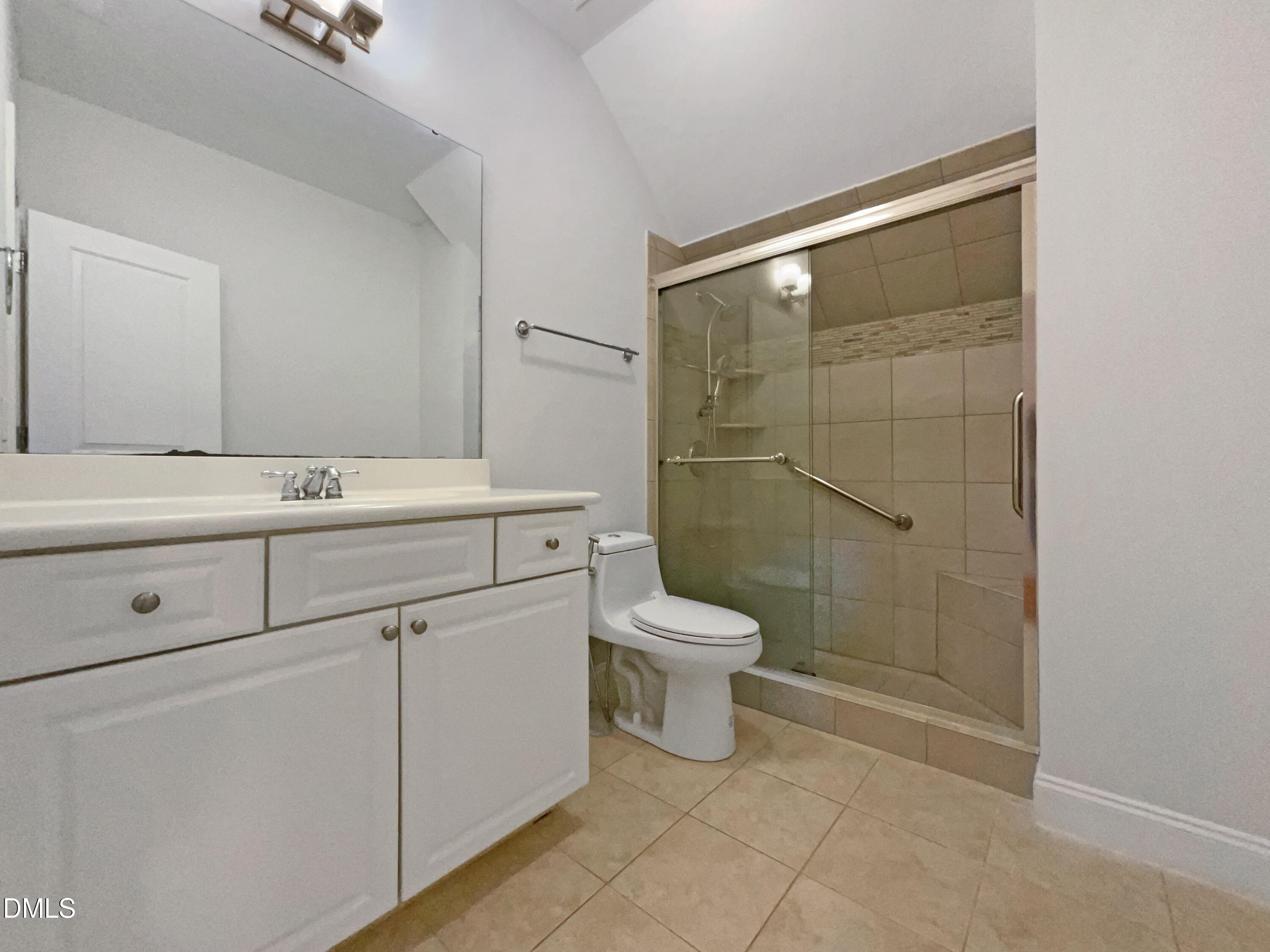 1703 Happiness Hill Lane Raleigh, NC 27614 - Photo 24 of 30 a bathroom with a toilet a sink and shower
