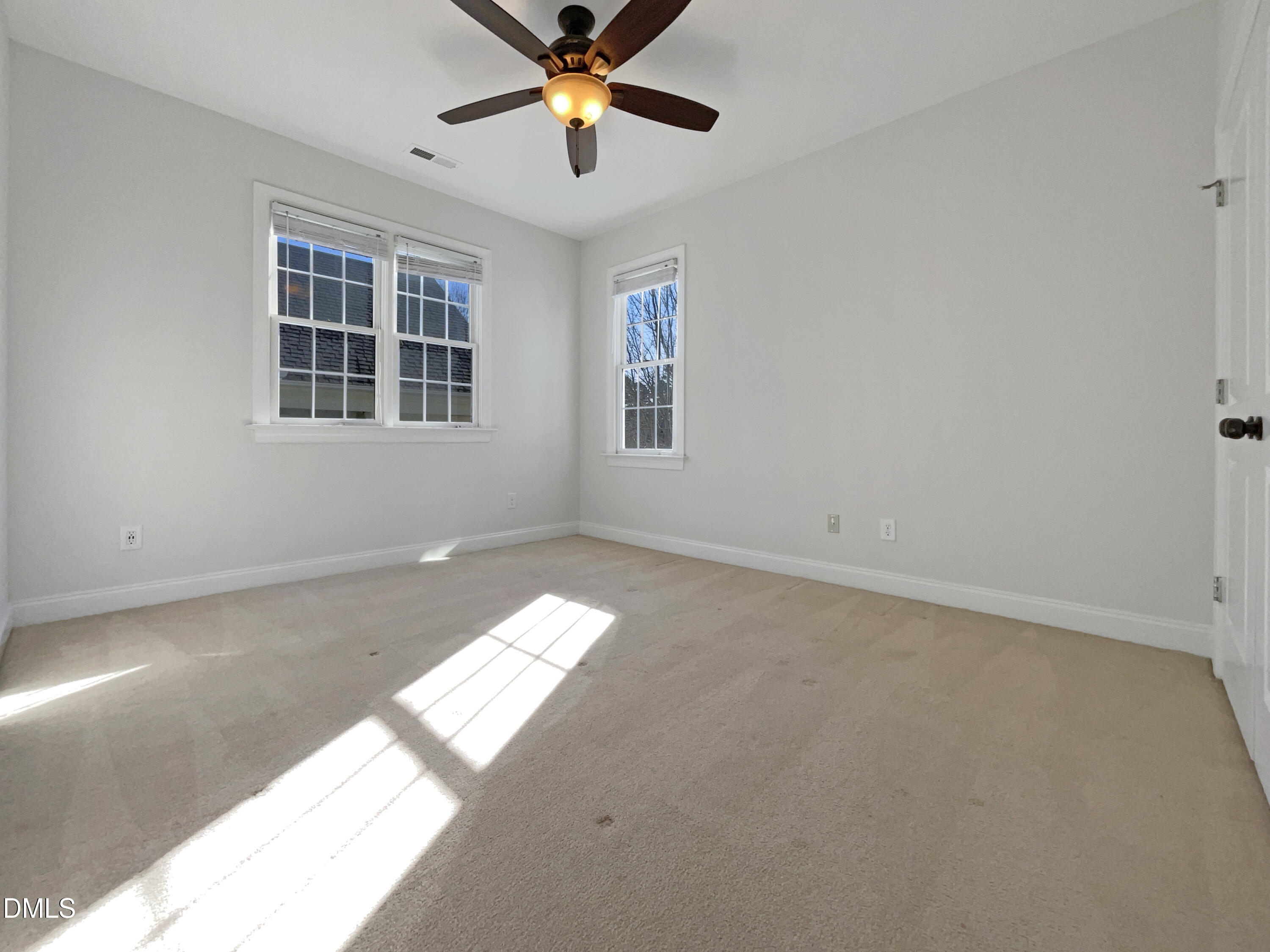 1703 Happiness Hill Lane Raleigh, NC 27614 - Photo 4 of 30 a view of an empty room with a window