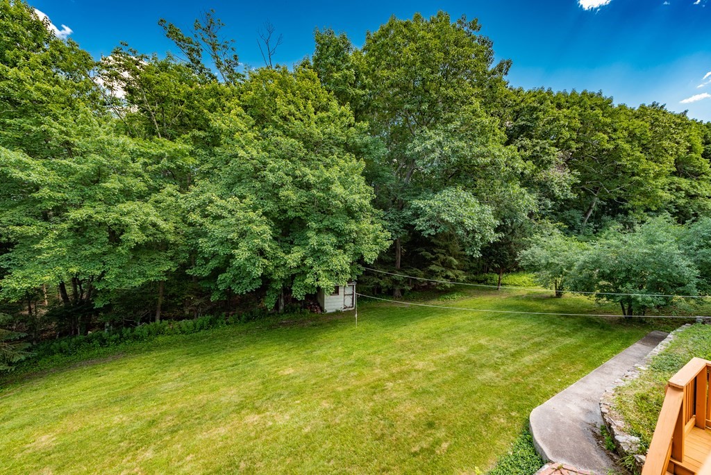 46 Pilgrim Road Braintree, MA 02184 - Photo 11 of 35 a view of a swimming pool with a patio