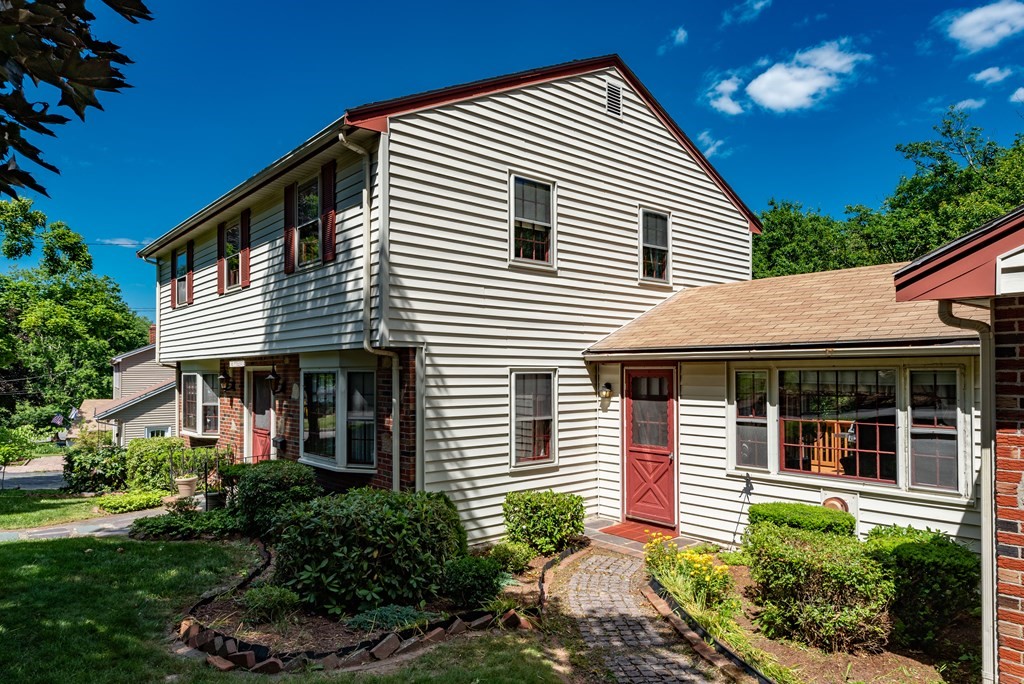 46 Pilgrim Road Braintree, MA 02184 - Photo 14 of 35 a front view of a house with a yard