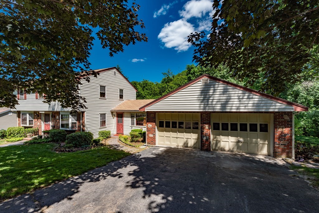 46 Pilgrim Road Braintree, MA 02184 - Photo 2 of 35 a front view of a house with garden