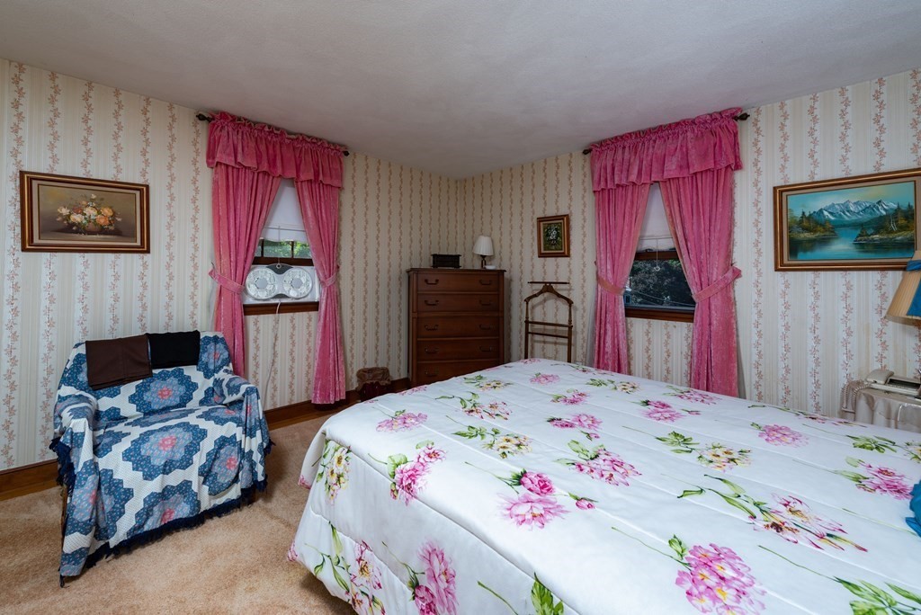 46 Pilgrim Road Braintree, MA 02184 - Photo 34 of 35 a bedroom with a bed and a dresser