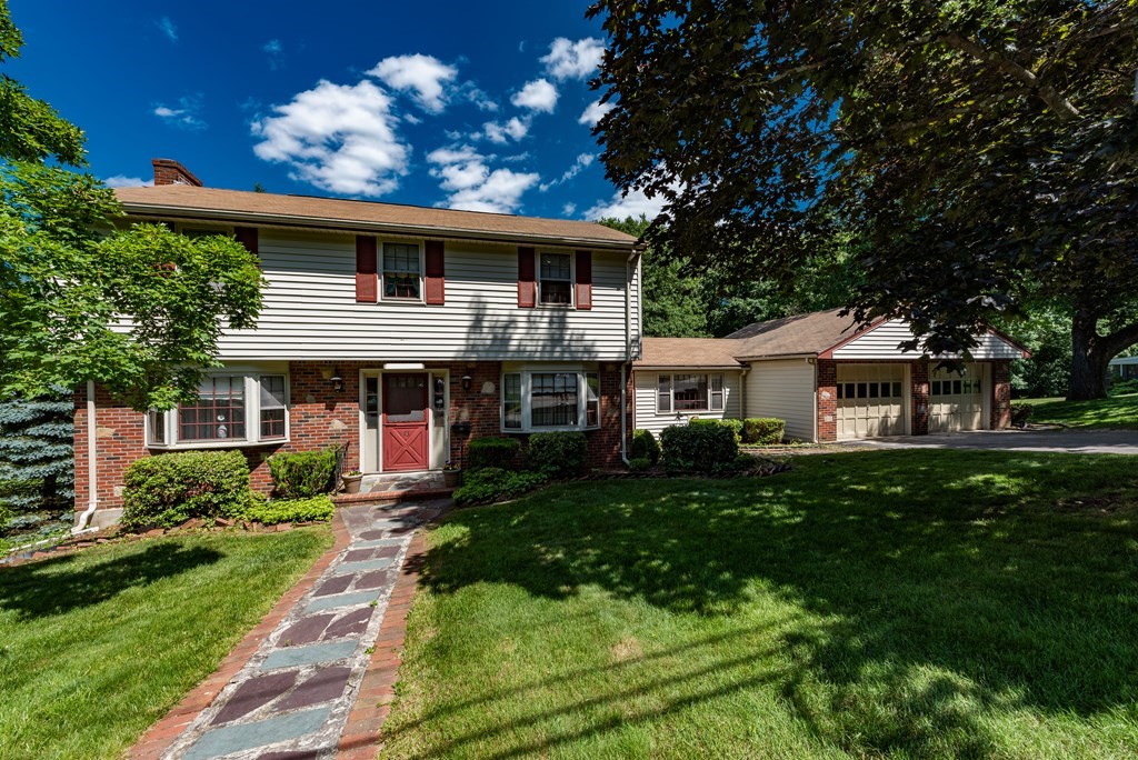 46 Pilgrim Road Braintree, MA 02184 - Photo 4 of 35 a front view of house with yard and green space