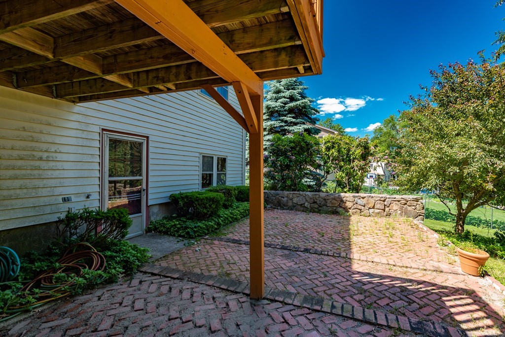 46 Pilgrim Road Braintree, MA 02184 - Photo 7 of 35 a view of a backyard