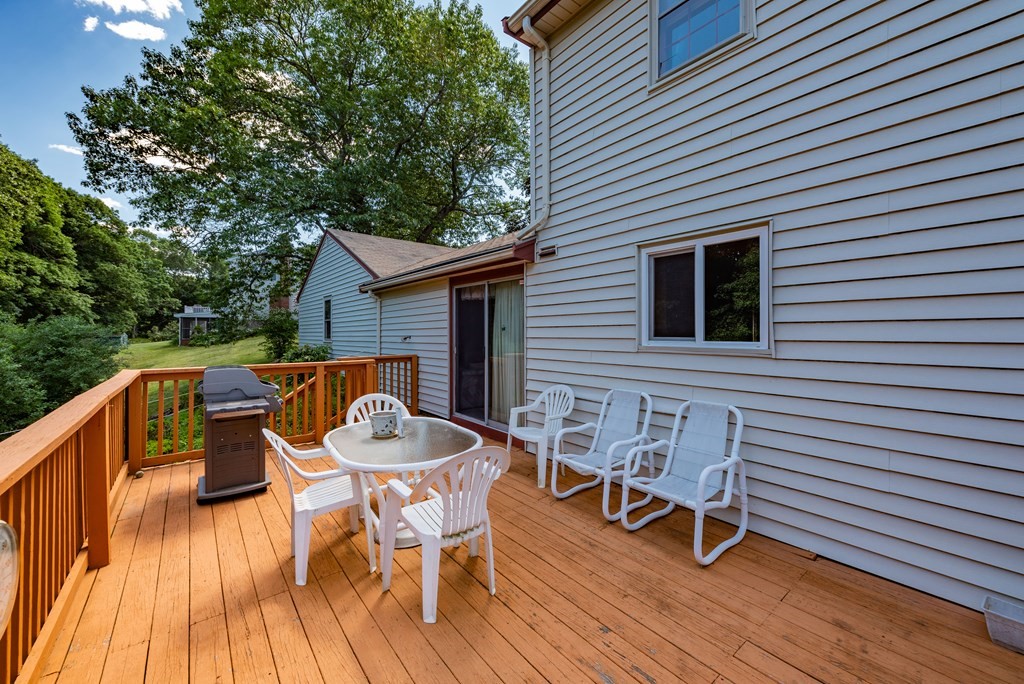 46 Pilgrim Road Braintree, MA 02184 - Photo 10 of 35 a view of a patio with a table and chairs