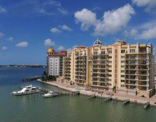 464 Golden Gate Point, Unit 604 Sarasota, FL 34236 - Photo 1 of 1 a view of building with lake view
