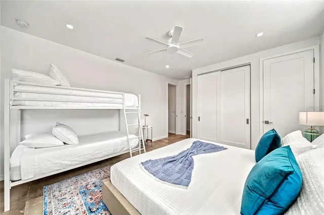 a bathroom with a toilet sink and shower