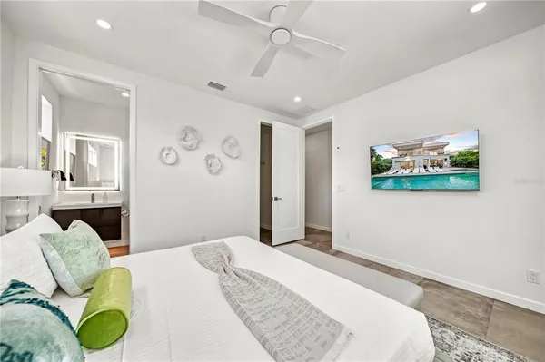 a bathroom with a toilet sink and shower