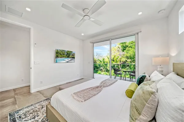 a view of balcony with furniture