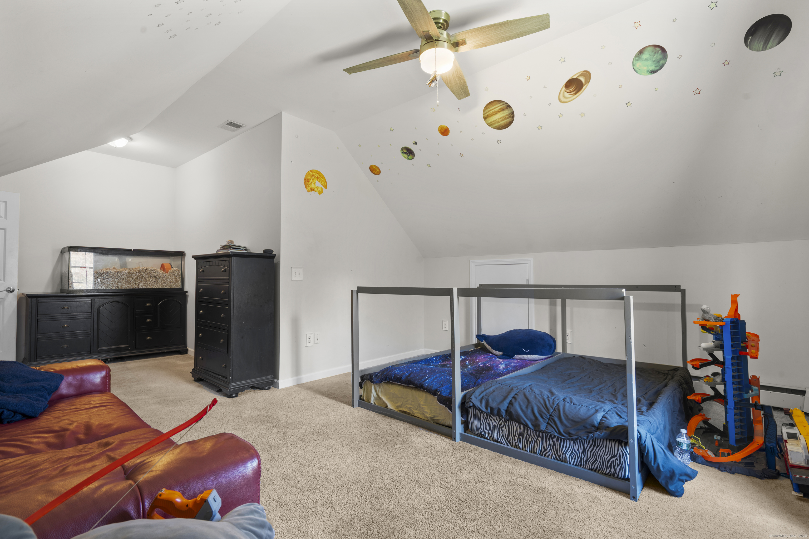 63 Taylor Road Colchester, CT 06415 - Photo 22 of 40 a bedroom with a bed and a tv