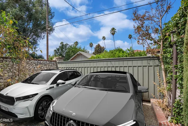 a view of a backyard with garden