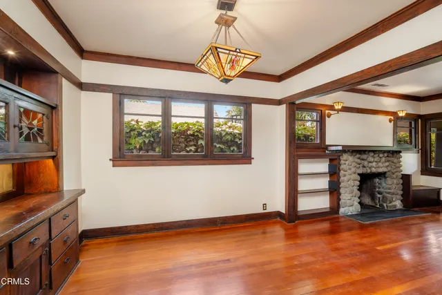 a kitchen with stainless steel appliances granite countertop a sink and a stove