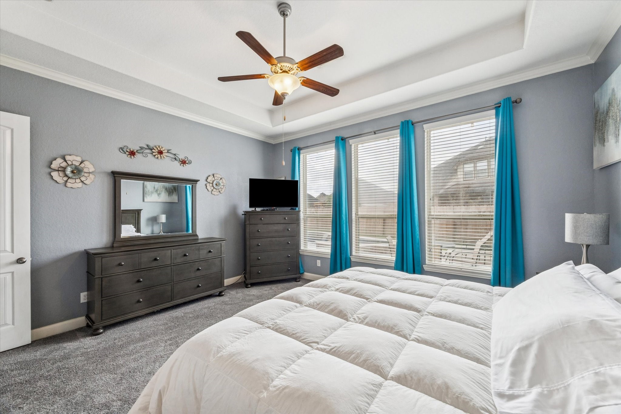 2283 Rising Bay Court League City, TX 77573 - Photo 18 of 45 The primary bedroom also has a view of the pool/spa!