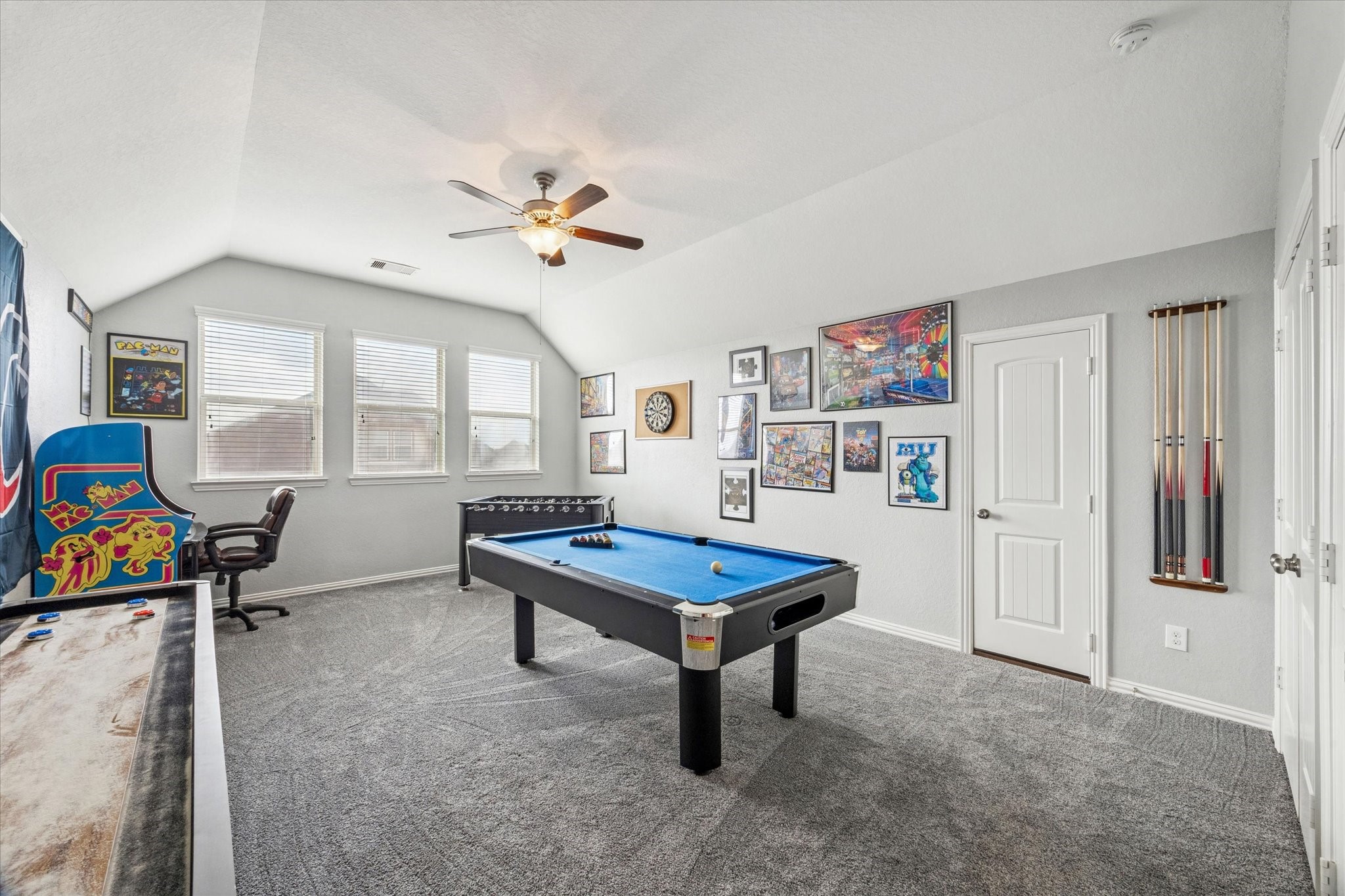 2283 Rising Bay Court League City, TX 77573 - Photo 22 of 45 Upstairs you will find a huge game room with room for all of your games!