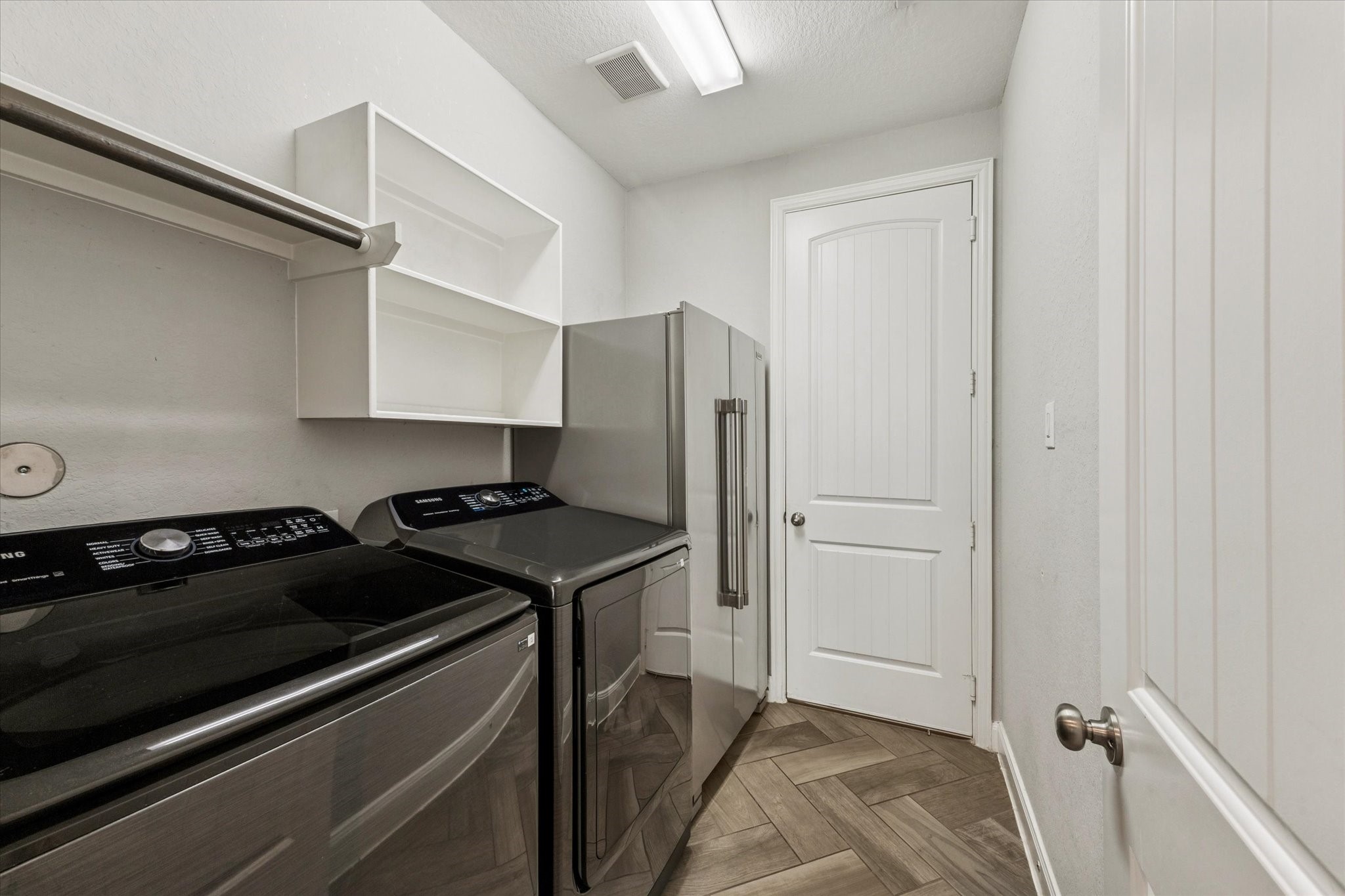 2283 Rising Bay Court League City, TX 77573 - Photo 36 of 45 Laundry room that leads to the garage.