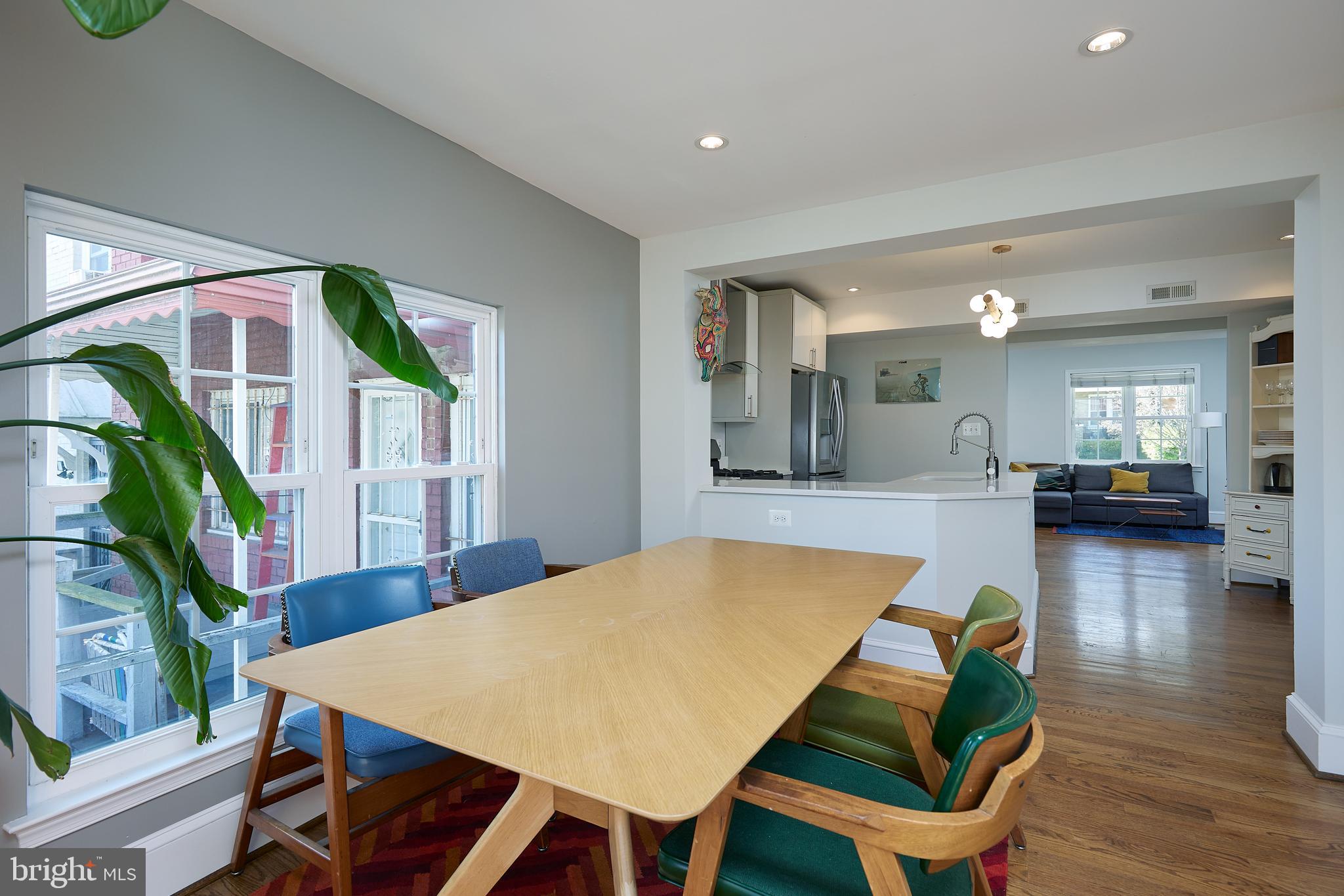 421 Longfellow Street Northwest Washington, DC 20011 - Photo 11 of 58 a room with furniture and a wooden floor