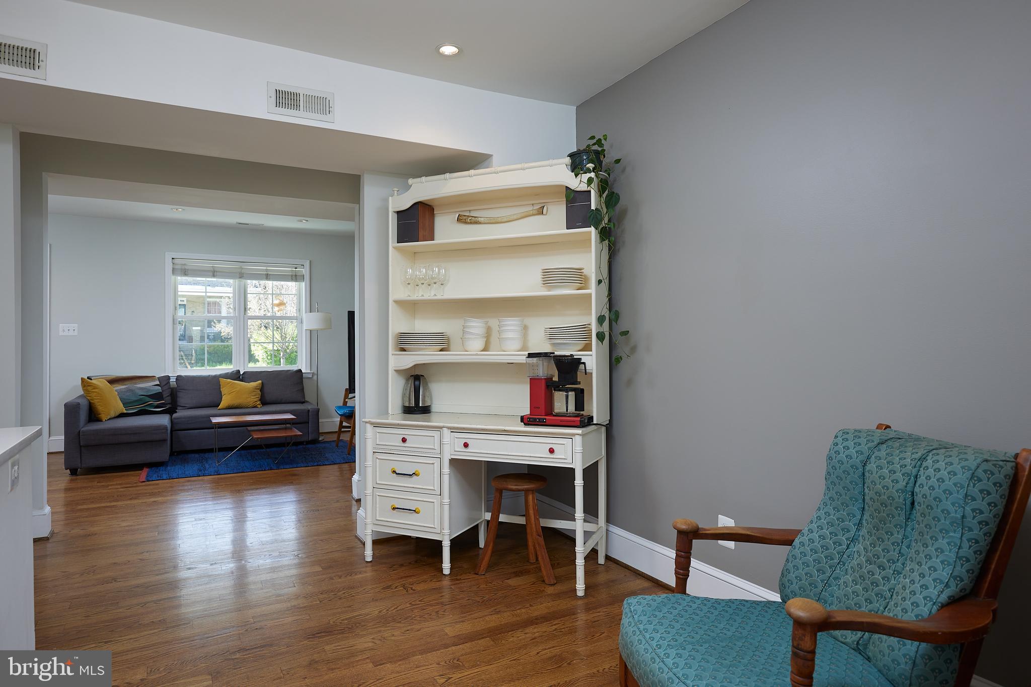 421 Longfellow Street Northwest Washington, DC 20011 - Photo 17 of 58 a living room with furniture and a wooden floor