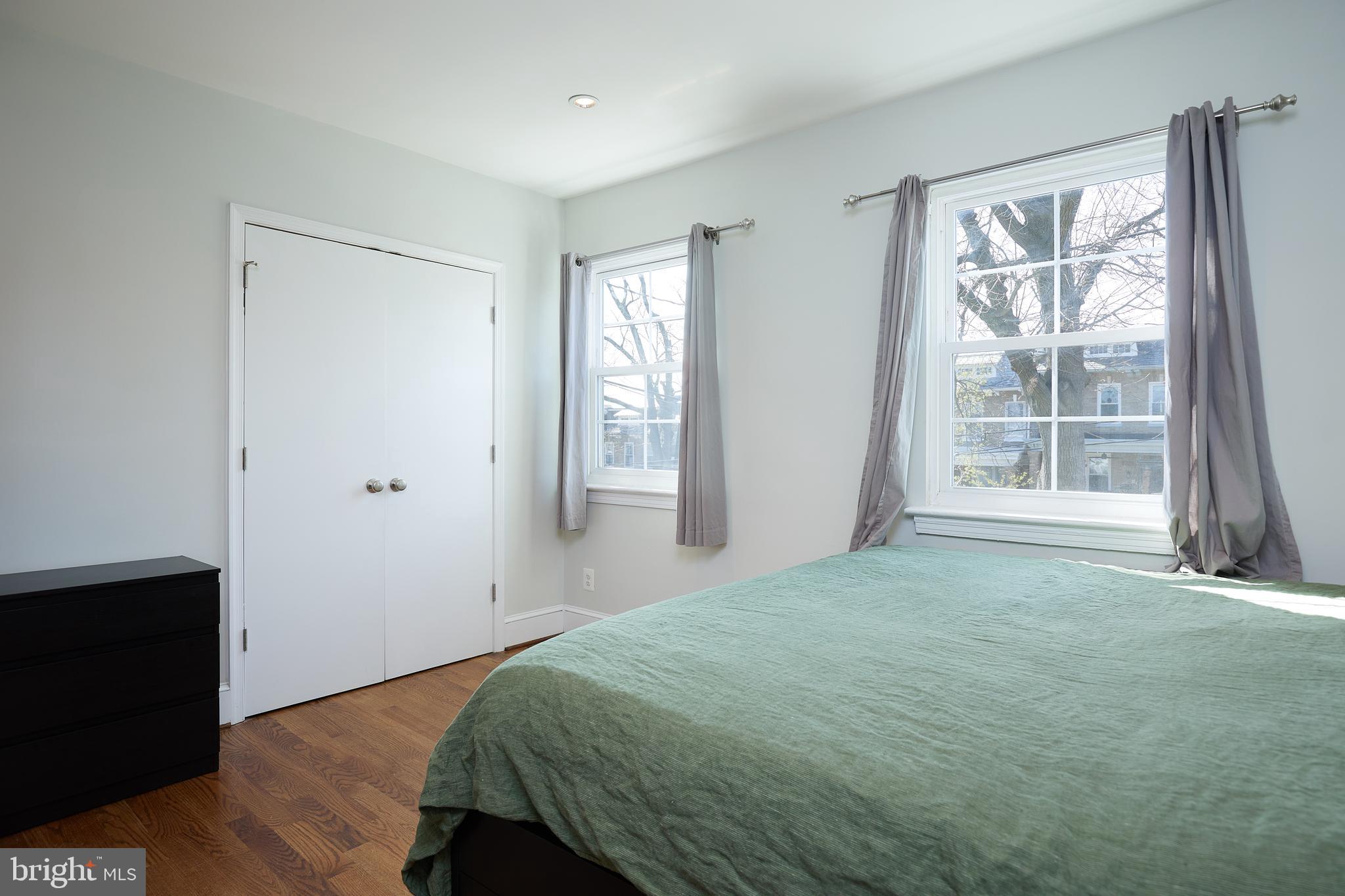 421 Longfellow Street Northwest Washington, DC 20011 - Photo 22 of 58 a bedroom with a bed and a window