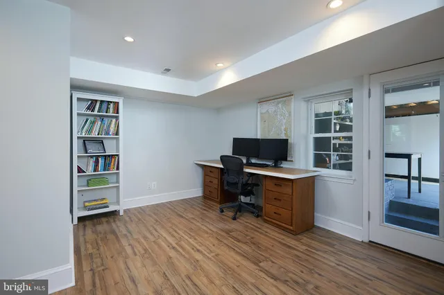 a view of entryway with stairs and wooden floor