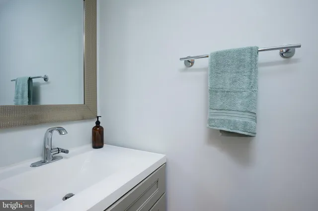 a view of a roof deck with wooden fence and floor
