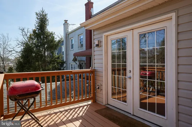 a view of a cars parked in front of a house