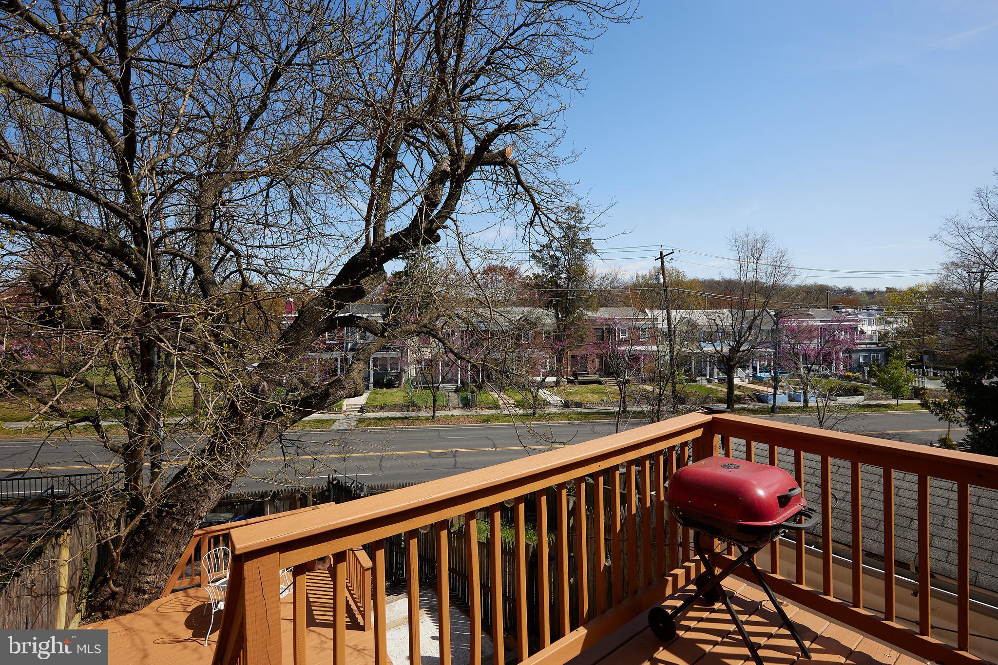 421 Longfellow Street Northwest Washington, DC 20011 - Photo 45 of 58 a view of a balcony with an outdoor space