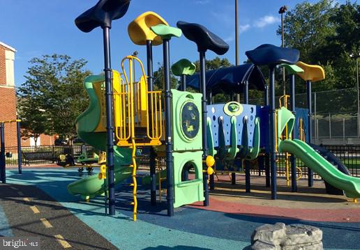 421 Longfellow Street Northwest Washington, DC 20011 - Photo 56 of 58 a view of street along with tall buildings