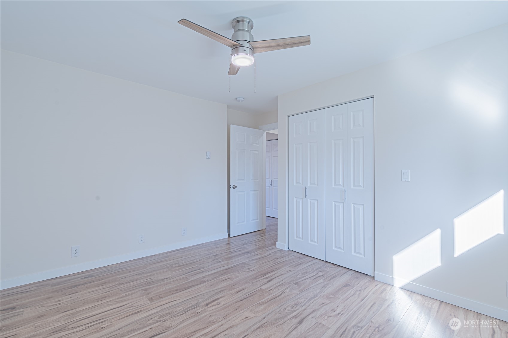 1125 Southwest 356th Street Federal Way, WA 98023 - Photo 14 of 27 wooden floor in an empty room
