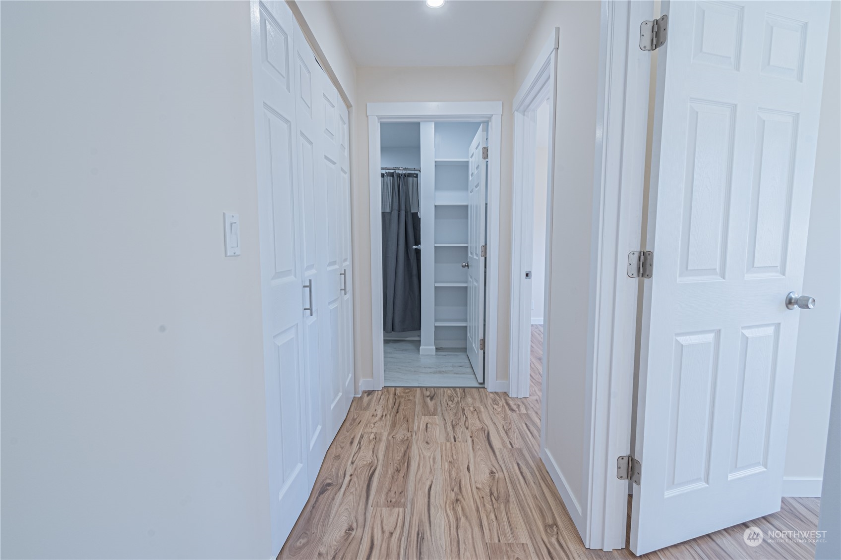 1125 Southwest 356th Street Federal Way, WA 98023 - Photo 15 of 27 a view of a hallway with wooden floor and entryway