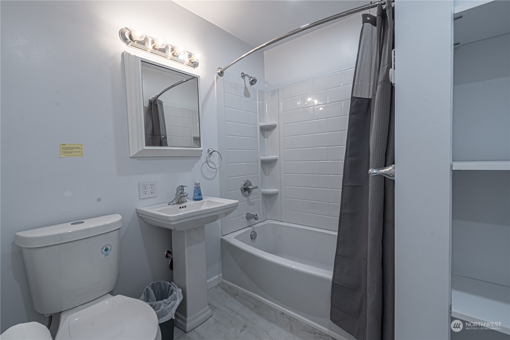 1125 Southwest 356th Street Federal Way, WA 98023 - Photo 21 of 27 a bathroom with a sink toilet and shower