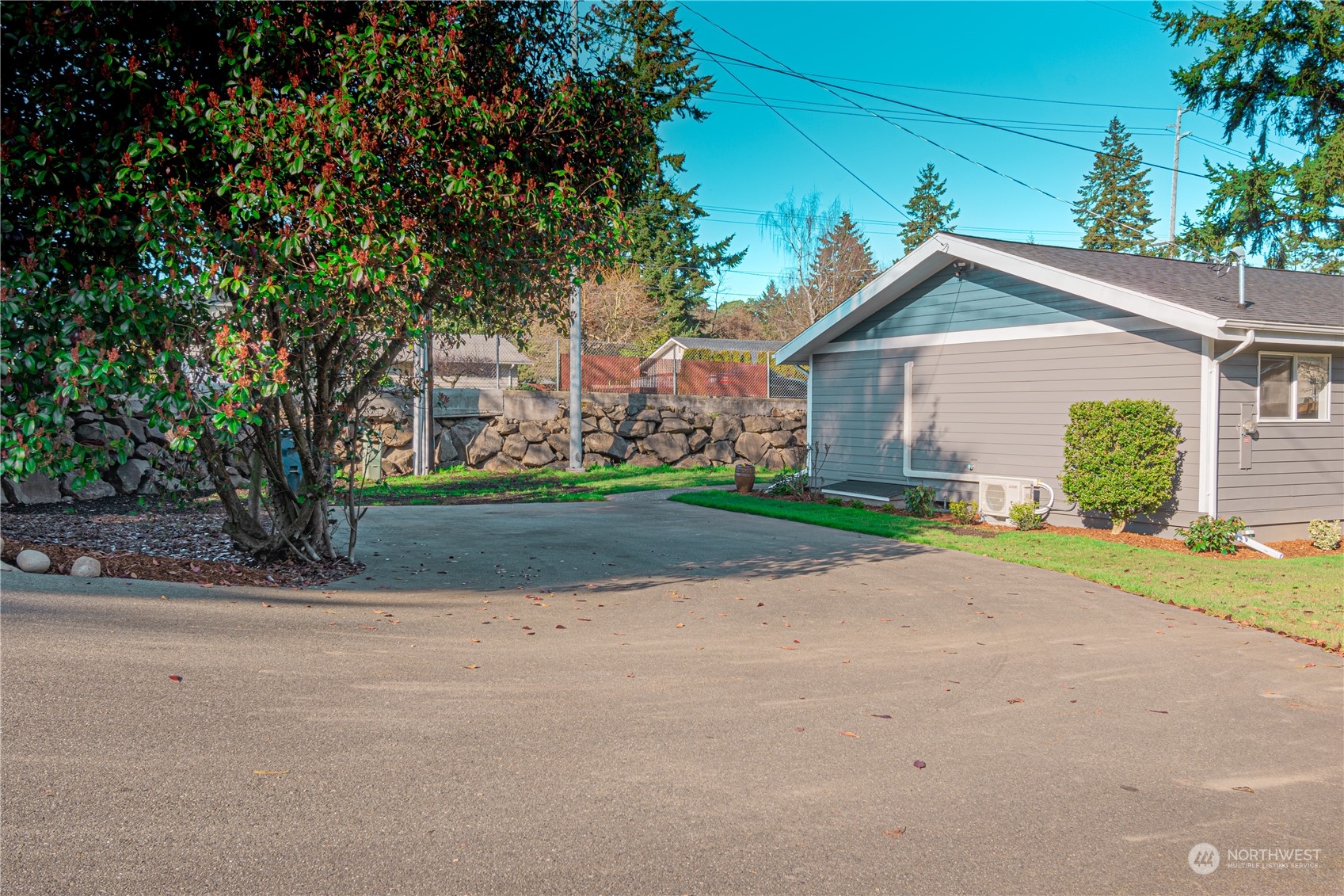 1125 Southwest 356th Street Federal Way, WA 98023 - Photo 24 of 27 a front view of house with yard and green space