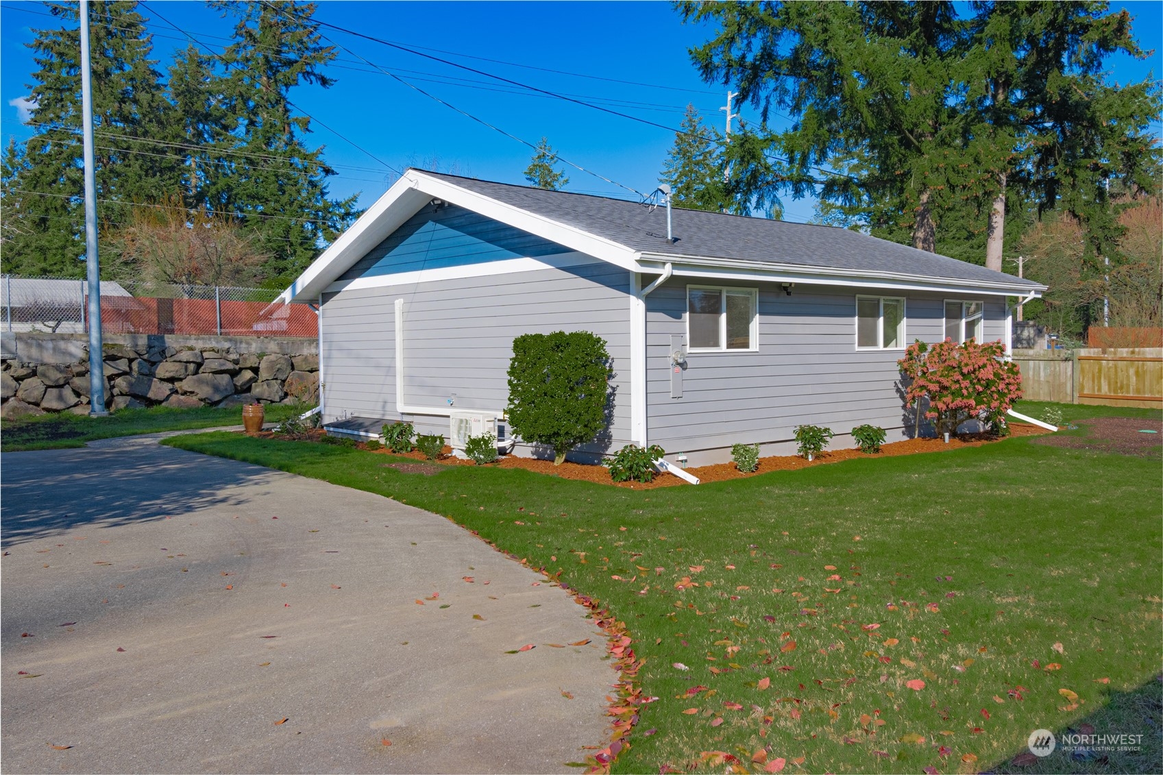 1125 Southwest 356th Street Federal Way, WA 98023 - Photo 3 of 27 a front view of house with yard and green space